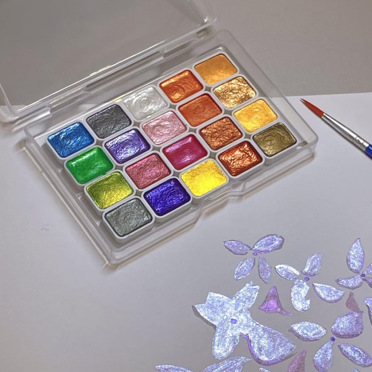 Handmade paint filled into 1ml plastic watercolor pans – ready for testing or sale