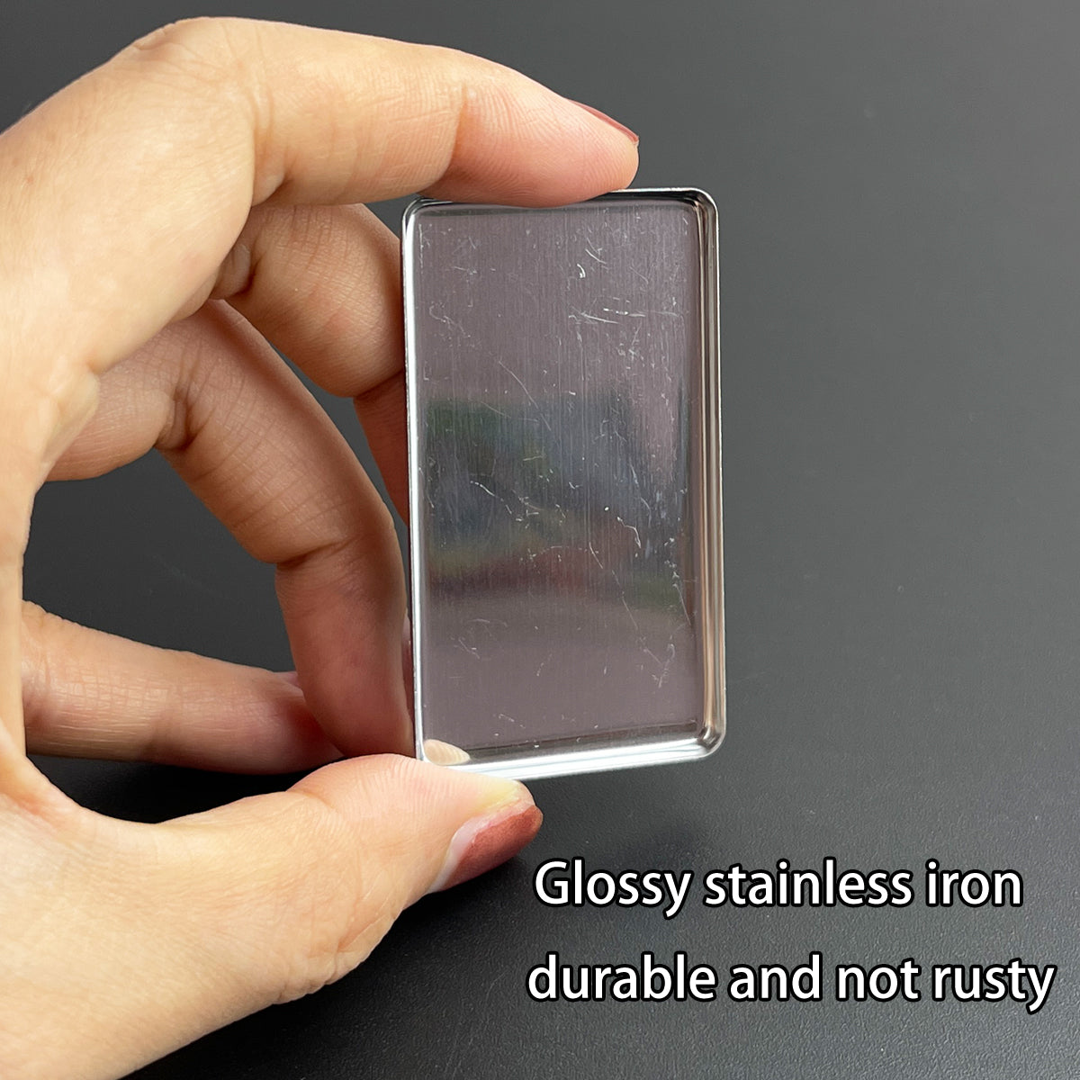 Glossy stainless iron metal pans held in hand – rust-resistant and durable for DIY paint and cosmetic use