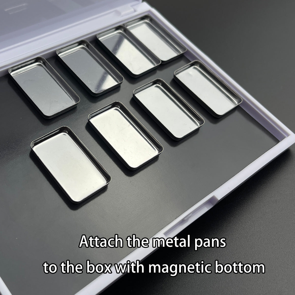 Metal pans placed inside magnetic palette – secure fit for travel-friendly watercolor sets or makeup testers
