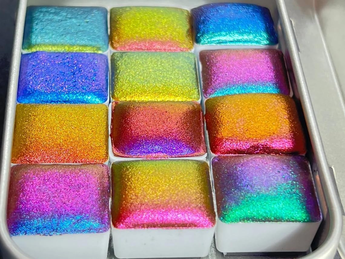 Close-up of watercolor half pans with smooth round corners for clean palette layout