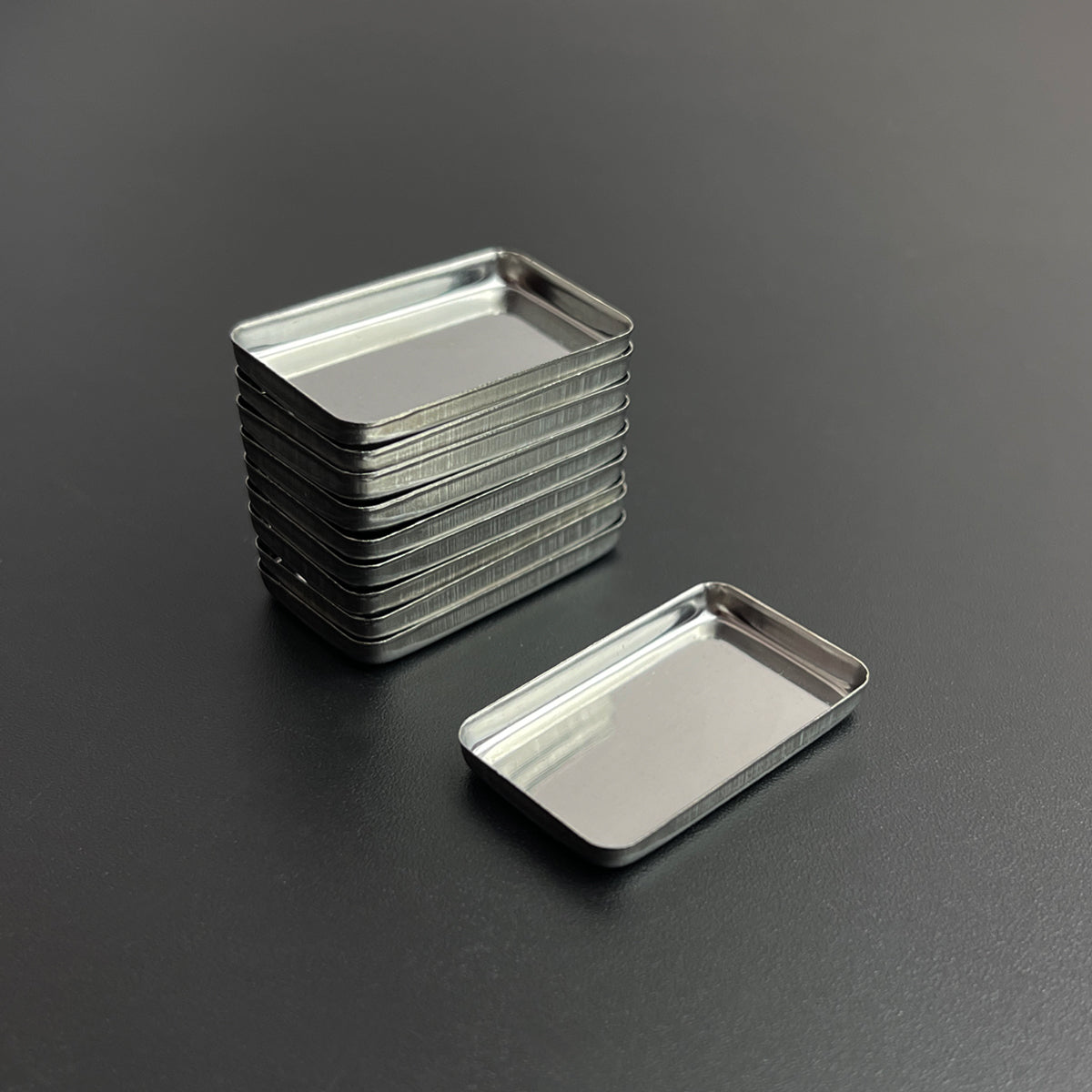 Stack of 1.8g rectangle metal pans – ideal for artists, custom palettes, and DIY cosmetics like eyeshadow or lip tint