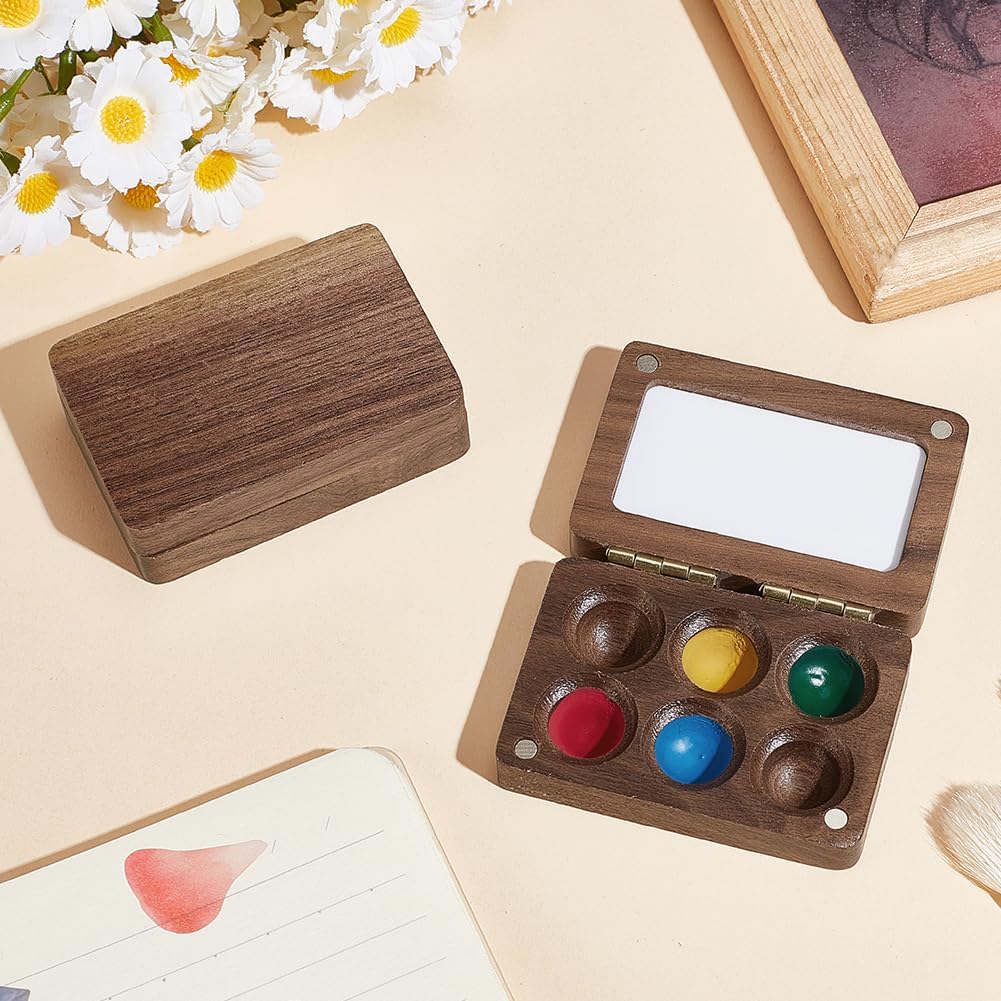 Artist using 6 wells walnut wood watercolor palette, ideal for watercolor, gouache, or acrylic painting