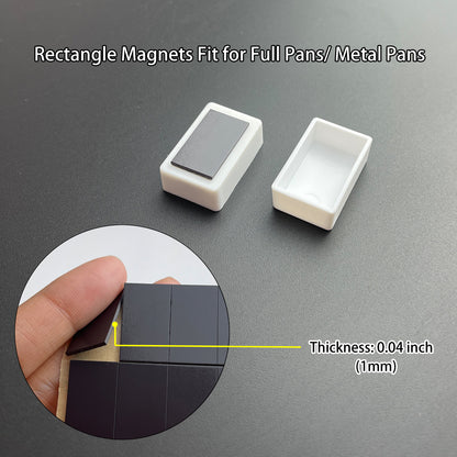 Attach watercolor pans to metal tins using peel-and-stick adhesive magnets