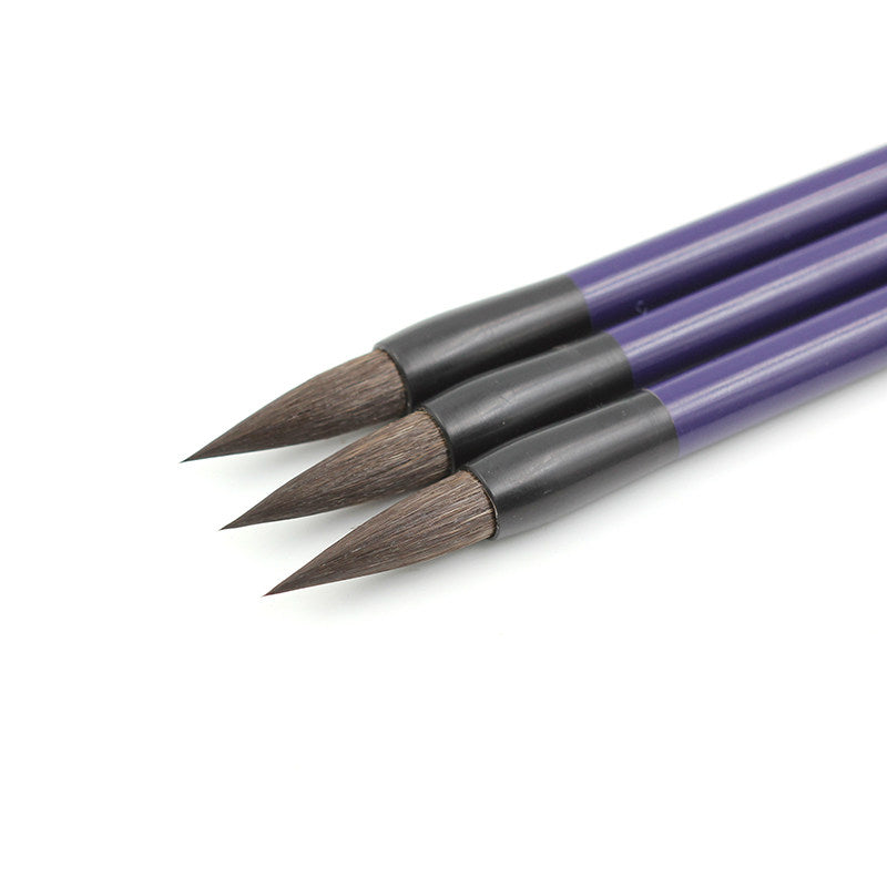Chinese painting brush with an elegant purple lacquered bamboo handle