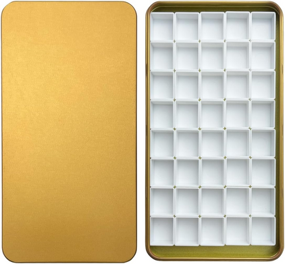 FCLUB gold watercolor tin with 40 empty half pans and magnetic squares, featuring a built-in mixing area for easy watercolor blending